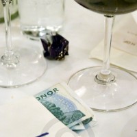 A bill and money on the table in a restaurant