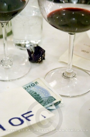 A bill and money on the table in a restaurant
