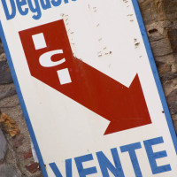 Sign advertising sales of wine in the wine shop