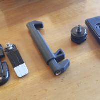 Smartphone tripod grips and adapter