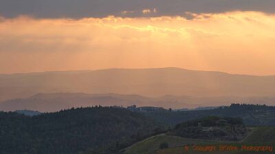 Evening sunshine over the rolling hills of the Tuscany landscape