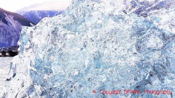 A crystal clear iceberg that recently rolled over in the Tasman Lake, next to Mount Cook, copyright BKWine Photography