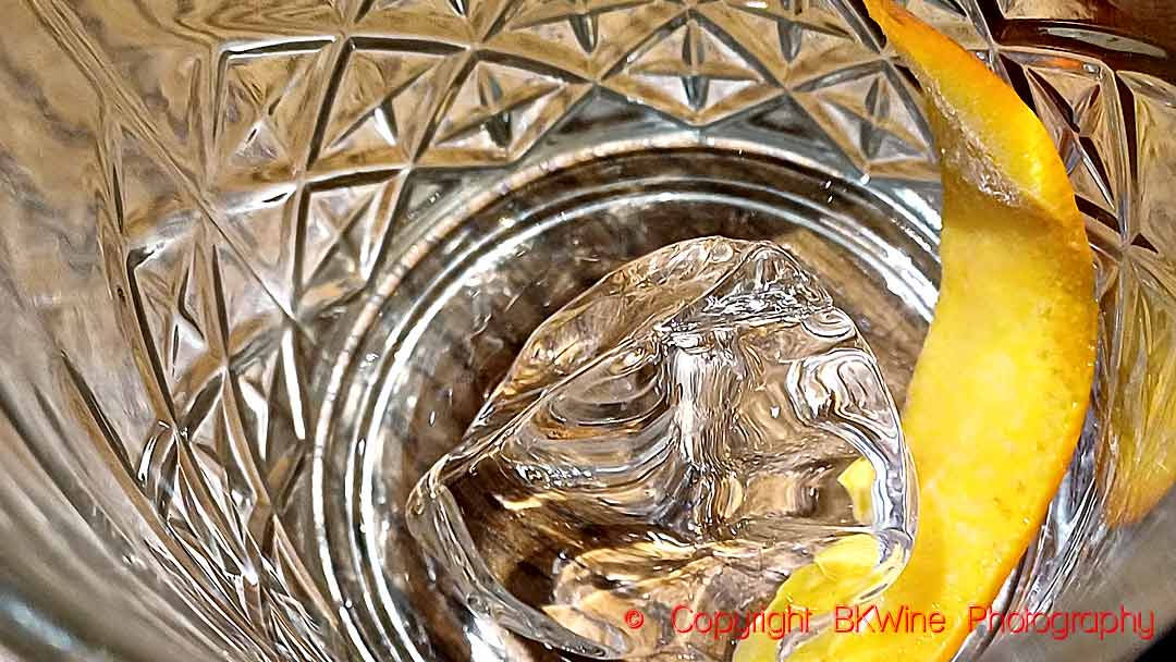Ice 2/5: A gin and tonic after the excursion on the Tasman Lake, with an ice cube from the lake from snow that fell 500 years ago, next to Mount Cook, copyright BKWine Photography